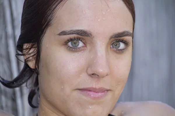 Close up of young woman fresh out of the water — Stock Photo, Image
