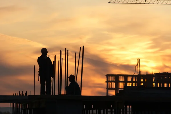 Builder at sunset — Stock Photo, Image