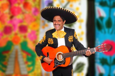 Charro Mariachi playing guitar serape poncho clipart