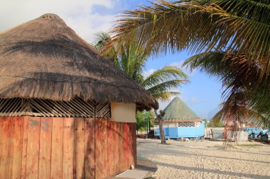 Tropical wood hut palapa in Cancun Mexico clipart