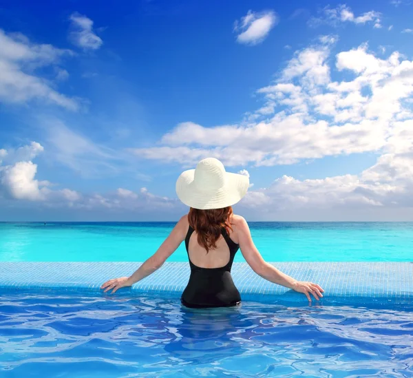 Caribbean sea view from blue pool rear woman — Stock Photo, Image