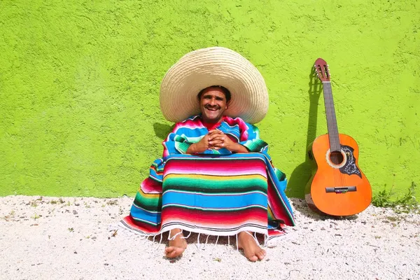 Mexican typical lazy topic man guitar poncho sit — Stock Photo, Image