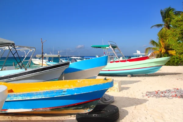 Colorful tropical boats beached in sand Isla Mujeres — Stock Photo, Image