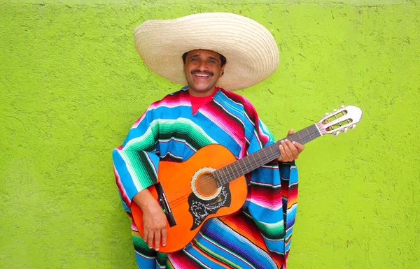Mexican typical man playing guitar poncho — Stock Photo, Image