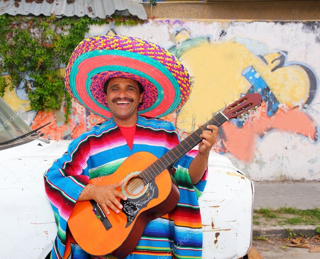 Mexican humor man smiling playing guitar sombrero