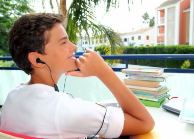 Boy teenager relaxed outdoor earphones clipart