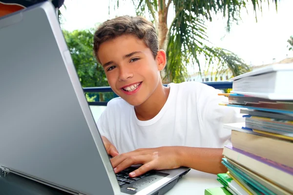 Happy teenager student boy working laptop — Stock Photo, Image