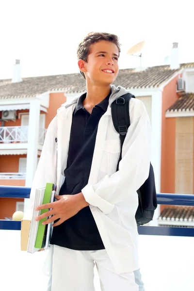 Fiú diák tinédzser hátizsák gazdaság könyvek — Stock Fotó