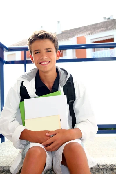Chlapec student teenager batoh drží knihy — Stock fotografie