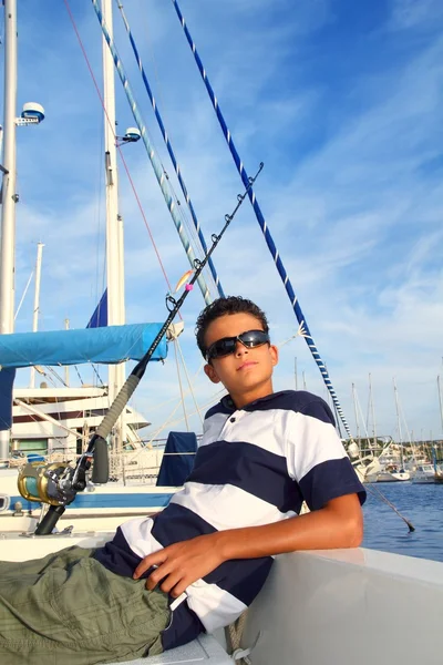 Boy relaxed teenager on boat marina summer vacation — Stock Photo, Image