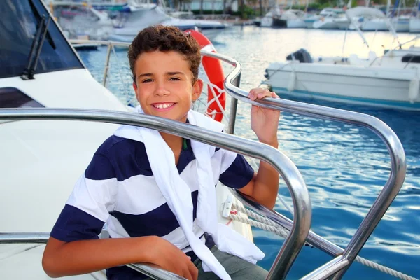 Teenager boy sea marina summer vacation in boat — Stock Photo, Image