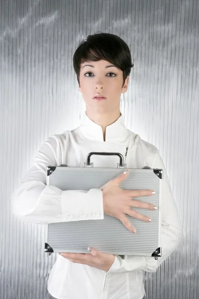 Mujer andrógina sosteniendo maletín de plata —  Fotos de Stock
