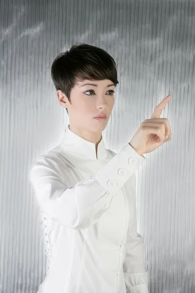 Futuristic businesswoman finger touching pad — Stock Photo, Image
