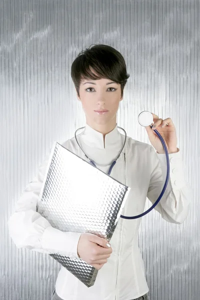 Estetoscopio de la futura doctora moderna sobre plata —  Fotos de Stock