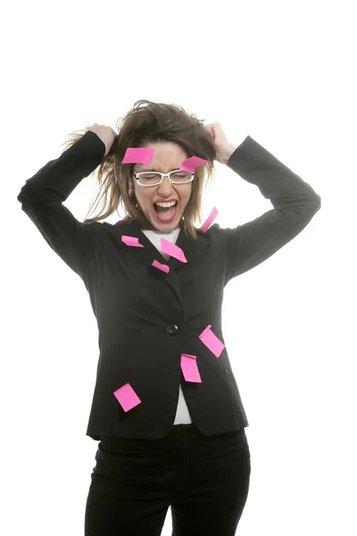 Бізнес-леді з багатозадачними рожевими нотами — стокове фото