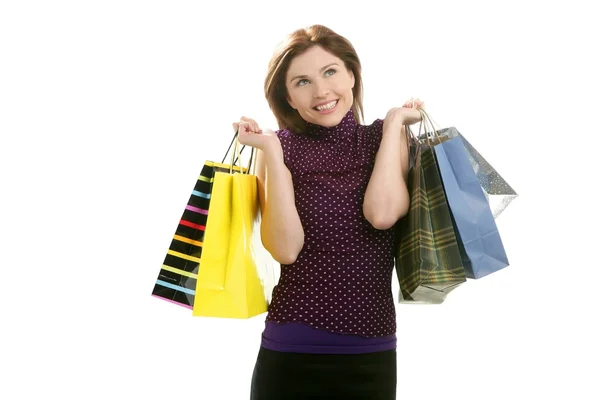 Shopaholic žena s barevné sáčky bílé — Stock fotografie