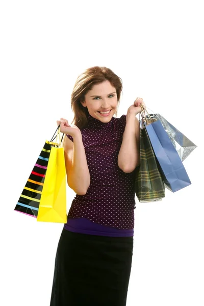 Shopaholic nő felett fehér színes táskák — Stock Fotó
