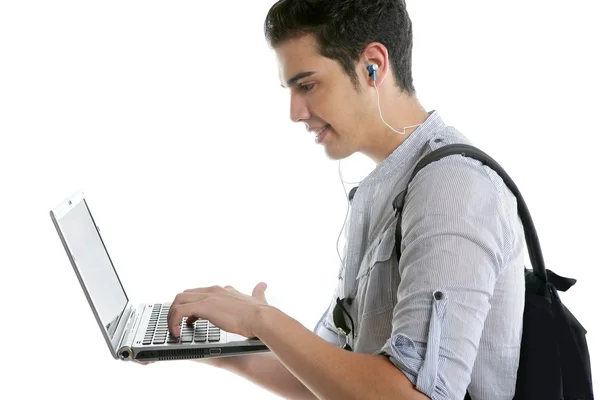Masculino joven estudiante tarea con portátil —  Fotos de Stock