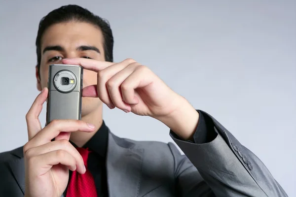 Biznesmen robienia zdjęć z aparatu w telefonie — Zdjęcie stockowe