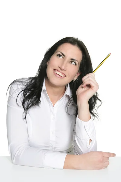 Μελαχρινή γυναίκα σκέφτεται με μολύβι — Φωτογραφία Αρχείου