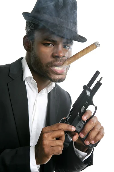 Afrikansk amerikansk mafia mand ryger cigar - Stock-foto