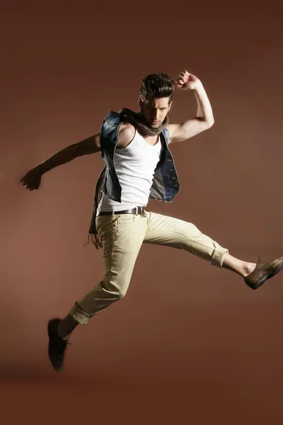 High jump fly young handsome fashion man — Stock Photo, Image