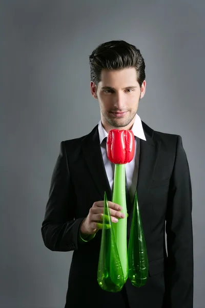 Hombre de negocios moderno San Valentín rosa flor en la mano — Foto de Stock