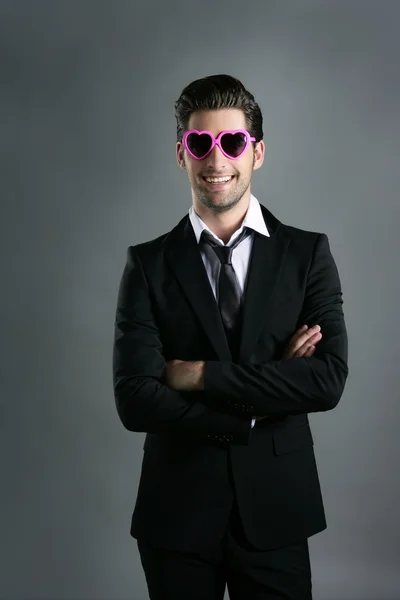 Funny heart shape pink sunglasses businessman — Stock Photo, Image