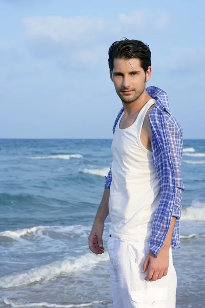 Mediterranean latin young man on beach — Stock Photo, Image