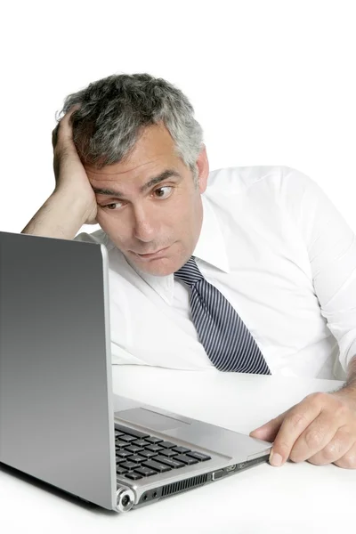 Relaxed senior businessman looking computer — Stock Photo, Image