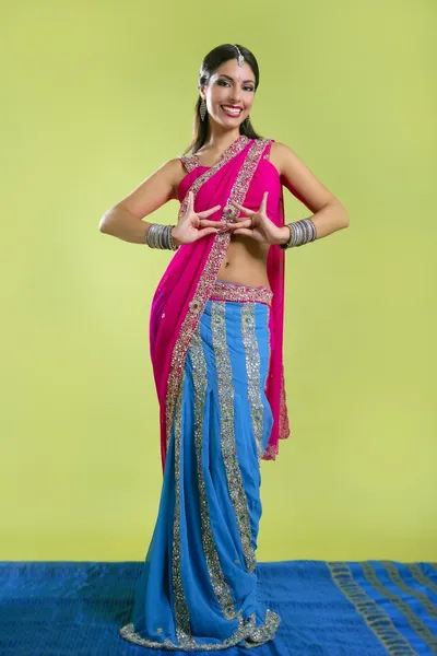 Beautiful indian young brunette woman dancing — Stock Photo, Image