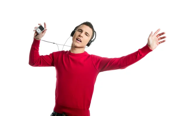 Young student boy dress in red hearing mp3 music — Stock Photo, Image