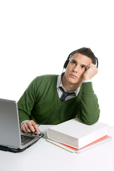 Hombre joven estudiante, ordenador, auriculares de música —  Fotos de Stock