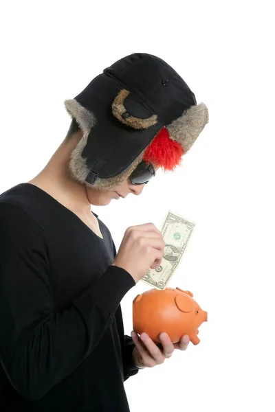 Gek jonge student jongen, een dollar in piggy bank — Stockfoto