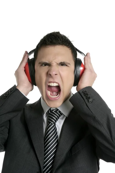保护免受噪音与耳机的商人 — 图库照片