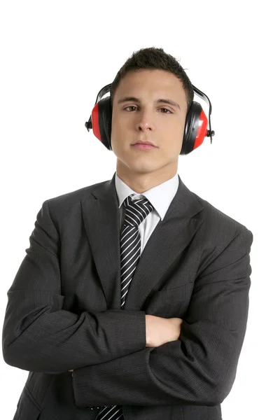 Young businessman protecting from noise — Stock Photo, Image