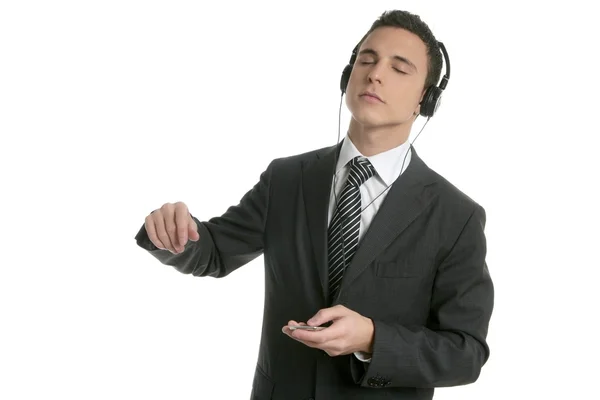 Knappe zakenman dansen hoorzitting muziek — Stockfoto