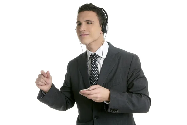 Guapo hombre de negocios bailando escuchando música — Foto de Stock