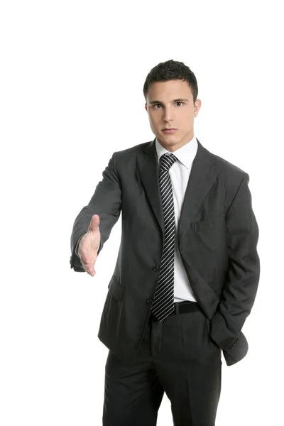 Businessman giving hand facing to camera — Stock Photo, Image
