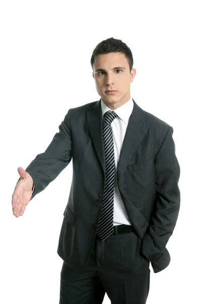 Businessman giving hand facing to camera — Stock Photo, Image