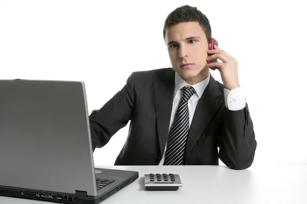 Biznesmen ze słuchawkami i laptopem — Zdjęcie stockowe