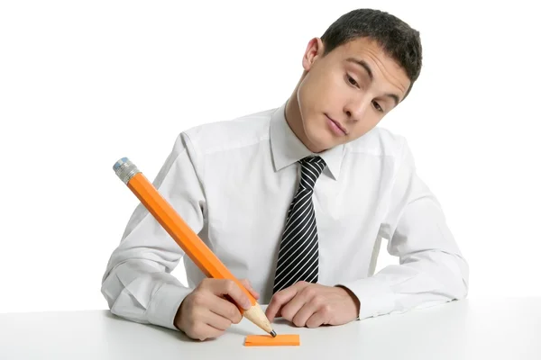 Jovem empresário estudante pensando com lápis — Fotografia de Stock