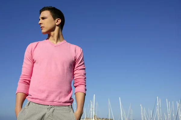 Handsome young man on summer in harbor — Stock Photo, Image