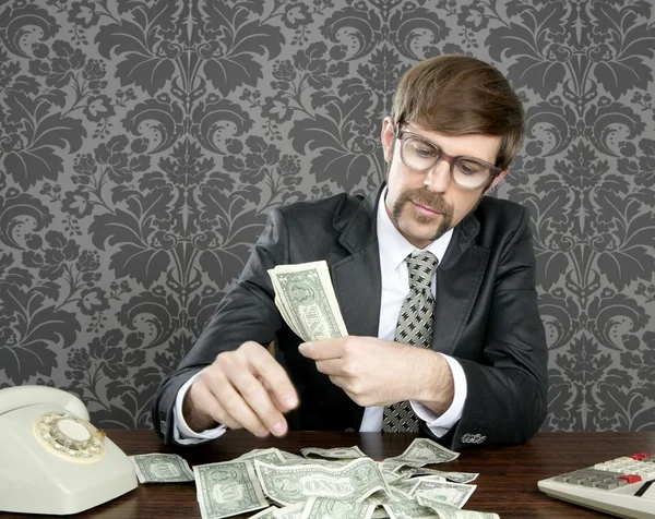 Biznesmen frajerem księgowego notatki dolara — Zdjęcie stockowe
