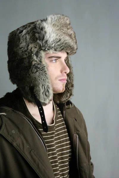 Fur winter fashion hat young man brown autumn — Stock Photo, Image