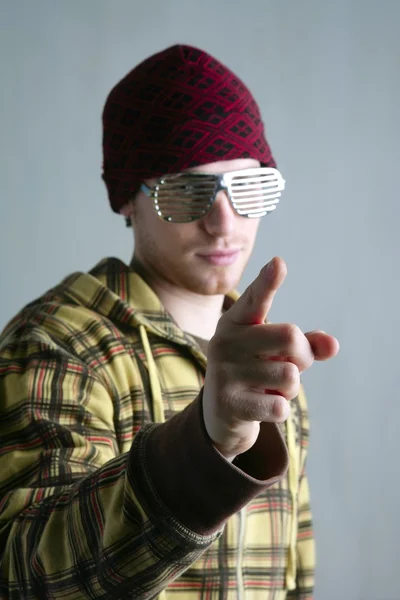 Young boy red cap finger gesture steel glasses — Stock Photo, Image
