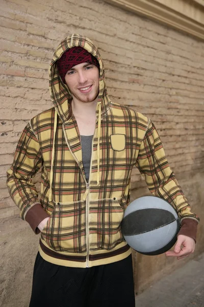 Grunge basket ball street player on brickwall — Stock Photo, Image