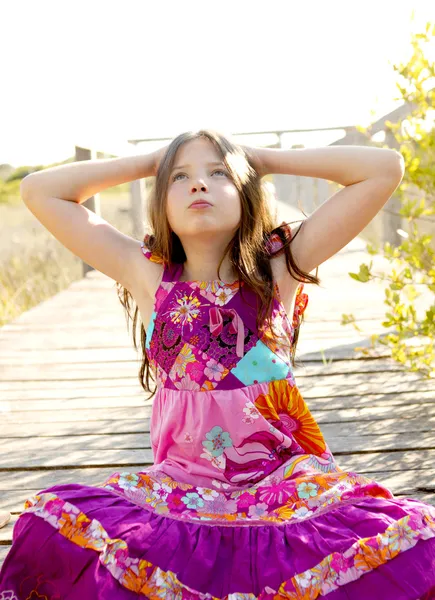 Hippy purple dress teen girl relaxed outdoors — Stock Photo, Image