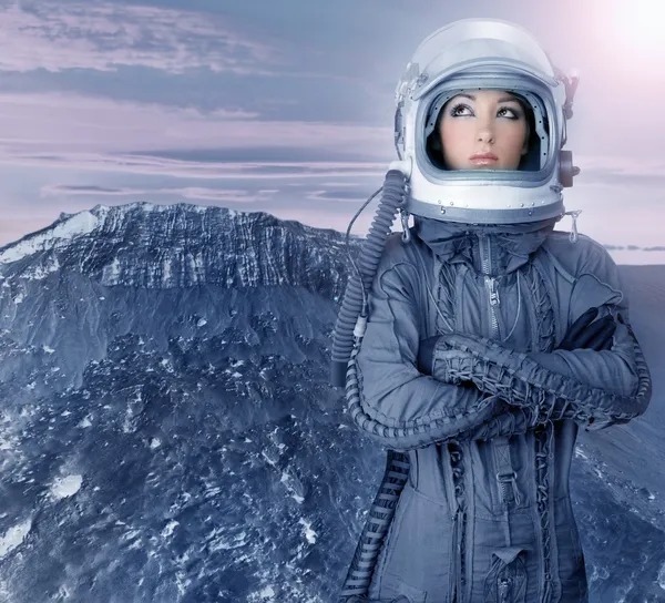Astronauta donna futuristica luna pianeti spaziali Foto Stock Royalty Free