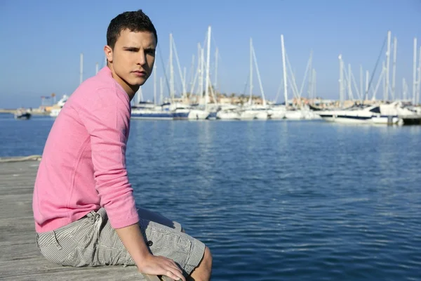 Handsome young man on summer in harbor — Stock Photo, Image